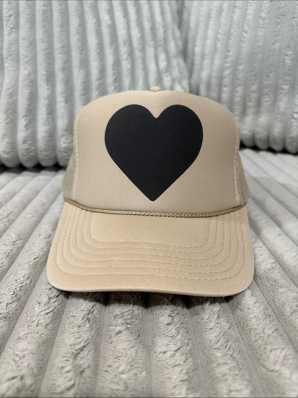 Beige Trucker Hat with Black Heart Graphic